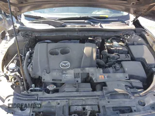 2014 Mazda 3 S Touring with VIN JM1BM1V37E1144331, listed as a IAAI auction lot 41880673 with 102,963 mi miles and . Bid and sale history available at DreamBid. Image 10.