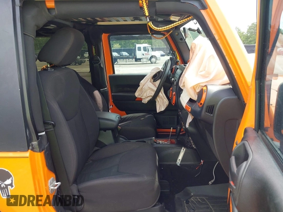 2013 Jeep Wrangler Sport z VIN 1C4AJWAG2DL538526, wystawiony jako IAAI lot #42378501 z przebiegiem 81 709 mil mil oraz . Historia ofert i sprzedaży dostępna na DreamBid. Obrazek 5.