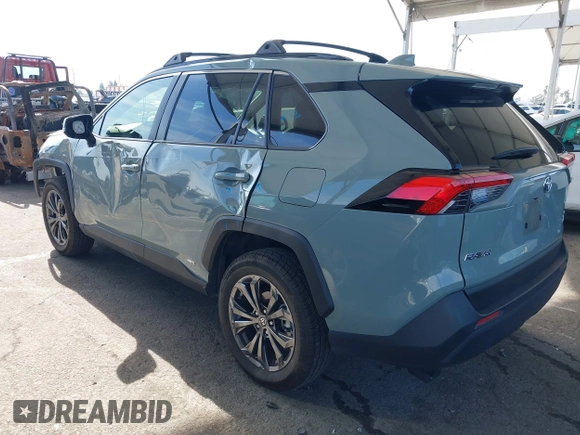 2023 Toyota RAV4 Hybrid XLE Premium with VIN JTMB6RFV8PD086983, listed as a IAAI auction lot 41612674 with 70,817 mi miles. Bid and sale history available at carsss.com. Image 3.