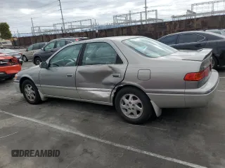 2001 Toyota Camry CE with VIN JT2BG22K010567849, listed as a Copart auction lot 50776555 with 114,514 mi miles and Salvage Title. Bid and sale history available at carsss.com. Image 2.