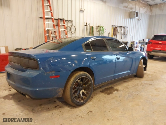 2014 Dodge Charger Police with VIN 2C3CDXAT5EH218901, listed as a IAAI auction lot 41723531 with 216,643 mi miles. Bid and sale history available at carsss.com. Image 4.
