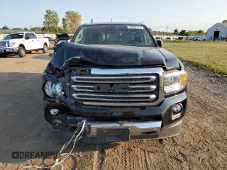 2017 GMC Canyon 4WD SLT with VIN 1GTG6DEN0H1299214, listed as a Copart auction lot 70293774 with 110,617 mi miles and Salvage Title. Bid and sale history available at carsss.com. Image 5.