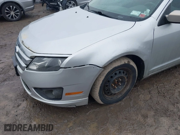 2012 Ford Fusion SE with VIN 3FAHP0HA9CR164546, listed as a IAAI auction lot 42016566 with 185,251 mi miles. Bid and sale history available at carsss.com. Image 6.