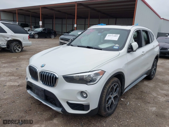 2019 BMW X1 xDrive28i with VIN WBXHT3C51K5L90392, listed as a IAAI auction lot 41571403 with 96,732 mi miles. Bid and sale history available at carsss.com. Image 17.