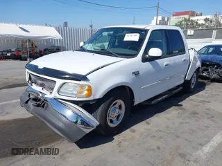 2003 Ford F-150 XLT with VIN 1FTRW07653KC82984, listed as a IAAI auction lot 42282305 with 933,470 mi miles and . Bid and sale history available at DreamBid. Image 2.