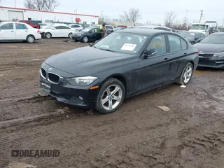 2015 BMW 3 Series 328i with VIN WBA3A5C53FP605447, listed as a IAAI auction lot 41649640 with 168,021 mi miles. Bid and sale history available at carsss.com. Image 2.