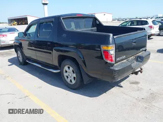 2008 Honda Ridgeline RTL with VIN 2HJYK16588H519676, listed as a IAAI auction lot 42561015 with 122,344 mi miles and . Bid and sale history available at DreamBid. Image 3.