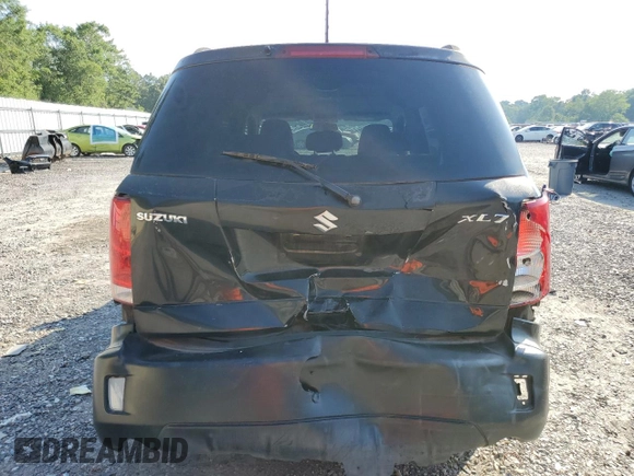 2007 Suzuki XL7 z VIN 2S3DB217576119703, wystawiony jako Copart lot #57472495 z przebiegiem 186 872 mil mil oraz Szkoda całkowita • Salvage title. Historia ofert i sprzedaży dostępna na DreamBid. Obrazek 6.