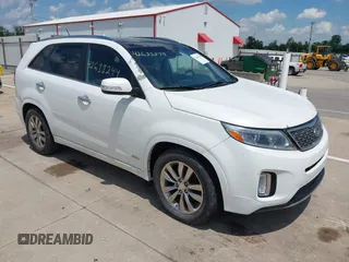 2014 Kia Sorento SX with VIN 5XYKWDA7XEG443445, listed as a IAAI auction lot 42611244 with 216,060 mi miles and . Bid and sale history available at DreamBid. Image 1.