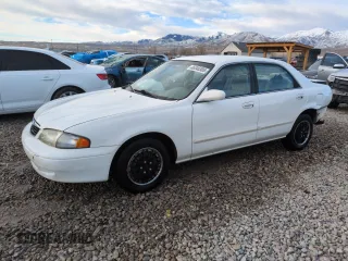 1999 Mazda 626 ES with VIN 1YVGF22C9X5887587, listed as a Copart auction lot 46346305 with 92,715 mi miles and Salvage Title. Bid and sale history available at carsss.com. Image 1.