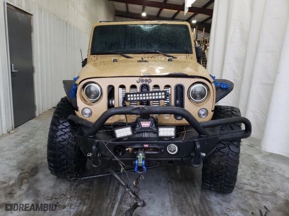 2012 Jeep Wrangler Unlimited Sahara with VIN 1C4BJWEG5CL281584, listed as a Copart auction lot 50982655 with 132,548 mi miles and Salvage Title. Bid and sale history available at carsss.com. Image 5.