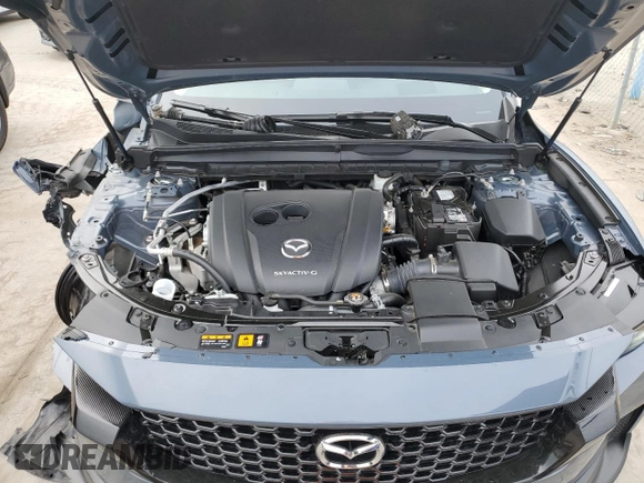 2023 Mazda CX-50 S Premium Plus with VIN 7MMVABEM7PN101642, listed as a Copart auction lot 47498675 with 12,299 mi miles and Salvage Title. Bid and sale history available at DreamBid. Image 12.
