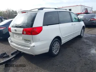 2008 Toyota Sienna LE with VIN 5TDBK23C28S010610, listed as a IAAI auction lot 41944472 with 149,223 mi miles. Bid and sale history available at carsss.com. Image 4.