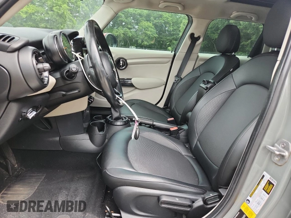 2015 MINI Hardtop 4 Door with VIN WMWXS5C5XFT831555, listed as a Copart auction lot 61673485 with 104,120 mi miles and Salvage title. Bid and sale history available at DreamBid. Image 7.