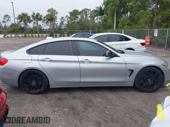 2015 BMW 4 Series 435i with VIN WBA4B1C58FG241018, listed as a IAAI auction lot 41401671 with 79,369 mi miles. Bid and sale history available at carsss.com. Image 13.