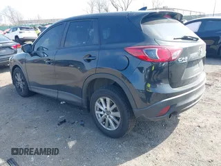 2016 Mazda CX-5 Sport with VIN JM3KE4BY3G0843177, listed as a IAAI auction lot 41804094 with 193,461 mi miles. Bid and sale history available at carsss.com. Image 3.