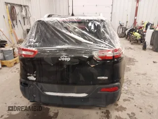 2017 Jeep Cherokee Latitude with VIN 1C4PJMCS0HW608416, listed as a IAAI auction lot 41523580 with 63,561 mi miles. Bid and sale history available at carsss.com. Image 16.