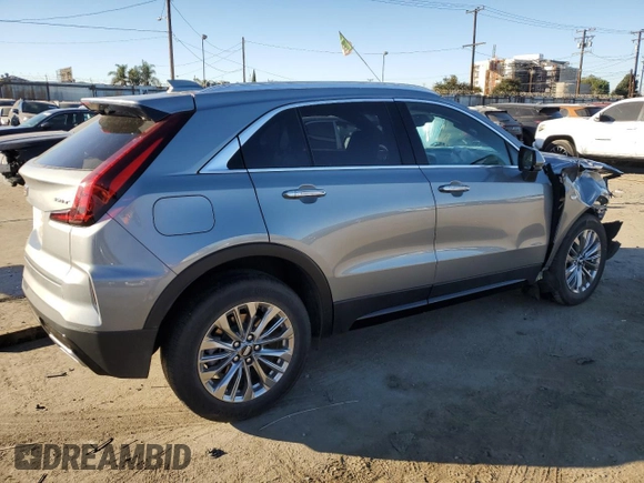 2024 Cadillac XT4 FWD Premium Luxury z VIN 1GYFZCR47RF126643, wystawiony jako Copart lot #50268745 z przebiegiem 24 583 mil mil oraz Czysty tytuł • Clean title. Historia ofert i sprzedaży dostępna na DreamBid. Obrazek 3.
