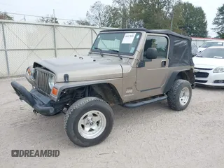 2003 Jeep Wrangler SE with VIN 1J4FA29113P304250, listed as a IAAI auction lot 40917099 with 191,589 mi miles. Bid and sale history available at carsss.com. Image 17.