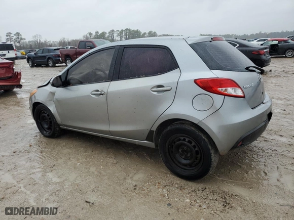 2013 Mazda Mazda2 Sport with VIN JM1DE1KY7D0161656, listed as a Copart auction lot 43076815 with 146,871 mi miles and Salvage Title. Bid and sale history available at carsss.com. Image 2.