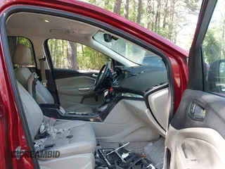 2014 Ford Escape Titanium with VIN 1FMCU9JX7EUB68165, listed as a IAAI auction lot 42141235 with 172,041 mi miles and . Bid and sale history available at DreamBid. Image 5.