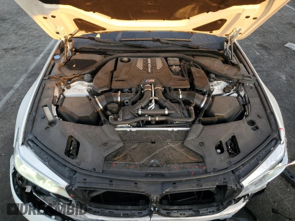 2019 BMW M5 z VIN WBSJF0C53KB284878, wystawiony jako Copart lot #86763564 z przebiegiem Nie podano mil oraz Szkoda całkowita • Salvage title. Historia ofert i sprzedaży dostępna na DreamBid. Obrazek 11.