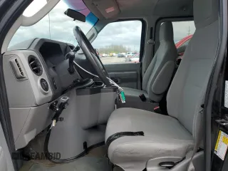 2012 Ford Econoline Passenger XL with VIN 1FBSS3BL3CDA97191, listed as a Copart auction lot 55284565 with 282,195 mi miles and Salvage title. Bid and sale history available at DreamBid. Image 7.