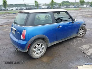2006 MINI Hardtop with VIN WMWRC33516TK18735, listed as a IAAI auction lot 42519124 with 135,976 mi miles and . Bid and sale history available at DreamBid. Image 4.