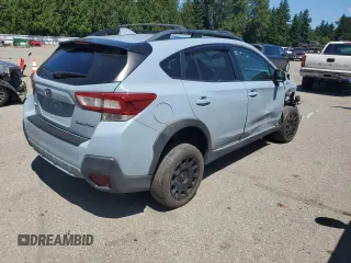 2018 Subaru Crosstrek Premium с VIN JF2GTADC2JH230305, выставлен на аукционе Copart как лот 60206555 с пробегом 156 577 миль миль и Списание • Salvage title. История ставок и продаж доступна на DreamBid. Изображение 3.
