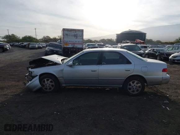 2000 Toyota Camry LE z VIN JT2BF28K6Y0282836, wystawiony jako IAAI lot #41799376 z przebiegiem 210 710 mil mil oraz . Historia ofert i sprzedaży dostępna na DreamBid. Obrazek 14.