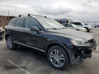 2016 Volkswagen Touareg Sport с VIN WVGEF9BP3GD011138, выставлен на аукционе Copart как лот 53557195 с пробегом 75 825 миль миль и Списание • Salvage title. История ставок и продаж доступна на DreamBid. Изображение 4.