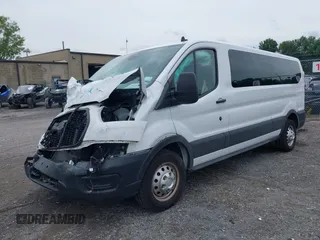 2023 Ford Transit Passenger XL with VIN 1FBAX9Y83PKC08567, listed as a IAAI auction lot 39883261 with 15,028 mi miles and . Bid and sale history available at DreamBid. Image 17.