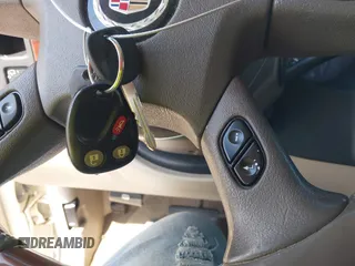 2005 Cadillac Escalade z VIN 1GYEC63T55R115387, wystawiony jako IAAI lot #41791855 z przebiegiem 165 246 mil mil oraz . Historia ofert i sprzedaży dostępna na DreamBid. Obrazek 11.