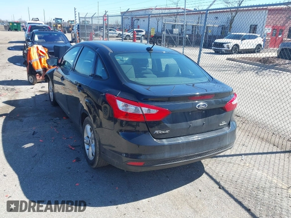 2014 Ford Focus SE with VIN 1FADP3F22EL207587, listed as a IAAI auction lot 41818555 with 119,811 mi miles. Bid and sale history available at carsss.com. Image 3.
