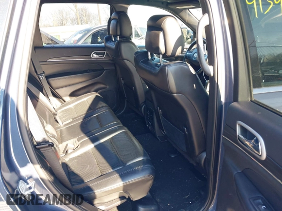 2021 Jeep Grand Cherokee 80th Anniversary with VIN 1C4RJFBG2MC666167, listed as a IAAI auction lot 41392185 with 79,518 mi miles and . Bid and sale history available at DreamBid. Image 8.