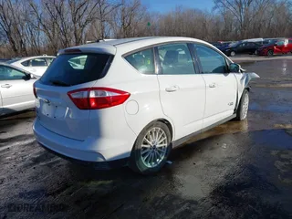 2016 Ford C-Max Energi SEL with VIN 1FADP5CU2GL118381, listed as a IAAI auction lot 41516426 with 220,361 mi miles. Bid and sale history available at carsss.com. Image 4.