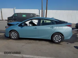 2016 Toyota Prius Four z VIN JTDKARFU6G3023120, wystawiony jako IAAI lot #41641228 z przebiegiem 117 334 mil mil oraz . Historia ofert i sprzedaży dostępna na DreamBid. Obrazek 13.
