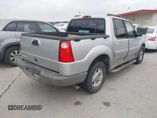 2002 Ford Explorer Sport Trac Value z VIN 1FMZU67EX2UB18161, wystawiony jako IAAI lot #42290334 z przebiegiem 192 498 mil mil oraz . Historia ofert i sprzedaży dostępna na DreamBid. Obrazek 4.