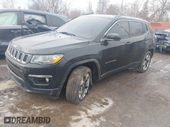 2020 Jeep Compass Limited with VIN 3C4NJDCB1LT146793, listed as a IAAI auction lot 41661239 with 91,148 mi miles and . Bid and sale history available at DreamBid. Image 2.