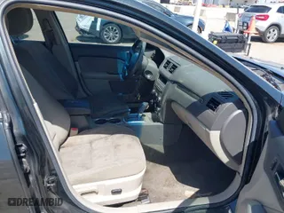 2010 Ford Fusion Hybrid with VIN 3FADP0L32AR371980, listed as a IAAI auction lot 42020330 with 272,984 mi miles. Bid and sale history available at carsss.com. Image 5.