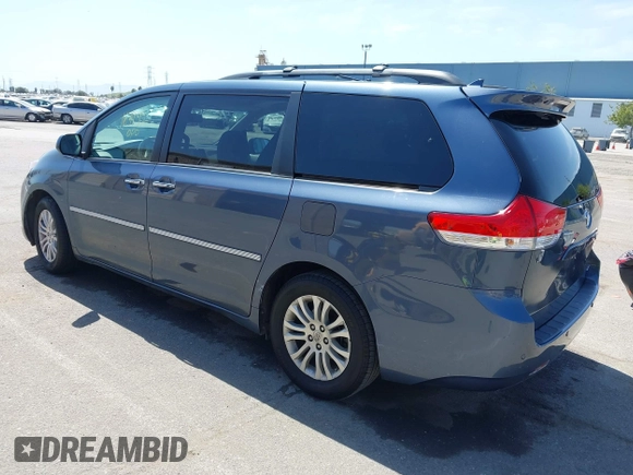 2014 Toyota Sienna XLE with VIN 5TDYK3DC5ES447155, listed as a IAAI auction lot 42003951 with 60,064 mi miles and . Bid and sale history available at DreamBid. Image 3.
