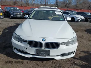 2014 BMW 3 Series 335i xDrive with VIN WBA3B9C52EJ466045, listed as a IAAI auction lot 41281384 with 136,329 mi miles. Bid and sale history available at carsss.com. Image 12.