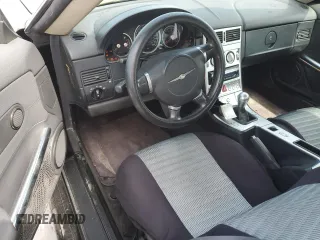 2005 Chrysler Crossfire z VIN 1C3AN55L75X053108, wystawiony jako Copart lot #76760814 z przebiegiem Nie podano mil oraz Szkoda całkowita • Salvage title. Historia ofert i sprzedaży dostępna na DreamBid. Obrazek 8.