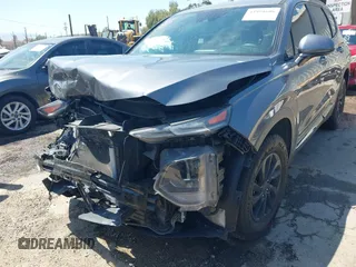 2019 Hyundai Santa Fe SE with VIN 5NMS23AD7KH009688, listed as a IAAI auction lot 41991686 with 77,942 mi miles and . Bid and sale history available at DreamBid. Image 6.