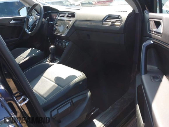 2021 Volkswagen Tiguan SE with VIN 3VV3B7AX1MM045478, listed as a IAAI auction lot 41947899 with 56,694 mi miles and . Bid and sale history available at DreamBid. Image 5.