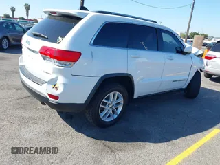 2018 Jeep Grand Cherokee Laredo E with VIN 1C4RJEAGXJC260645, listed as a IAAI auction lot 42002545 with Not provided miles and . Bid and sale history available at DreamBid. Image 4.