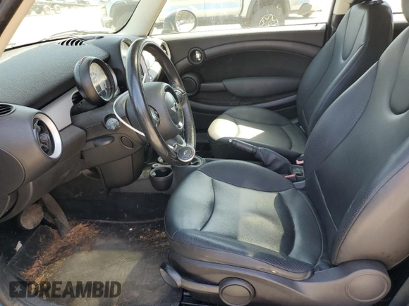 2013 MINI Hardtop with VIN WMWSU3C50DT682885, listed as a Copart auction lot 54238515 with 115,712 mi miles and Salvage Title. Bid and sale history available at DreamBid. Image 7.