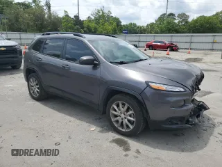 2018 Jeep Cherokee Latitude with VIN 1C4PJLCX0JD587753, listed as a Copart auction lot 54054545 with 128,194 mi miles and Salvage Title. Bid and sale history available at DreamBid. Image 4.