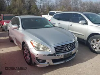 2012 Infiniti M37 with VIN JN1BY1AP6CM334617, listed as a IAAI auction lot 41756996 with 216,653 mi miles. Bid and sale history available at carsss.com. Image 1.