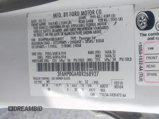 2011 Ford Fusion S with VIN 3FAHP0GA4BR268927, listed as a IAAI auction lot 41772569 with 305,339 mi miles. Bid and sale history available at carsss.com. Image 9.